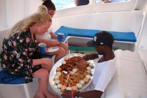 3 hour Glow Worm Sunset Cruise from Providenciales - On board in Providenciales: power vs. sail catamaran vibes