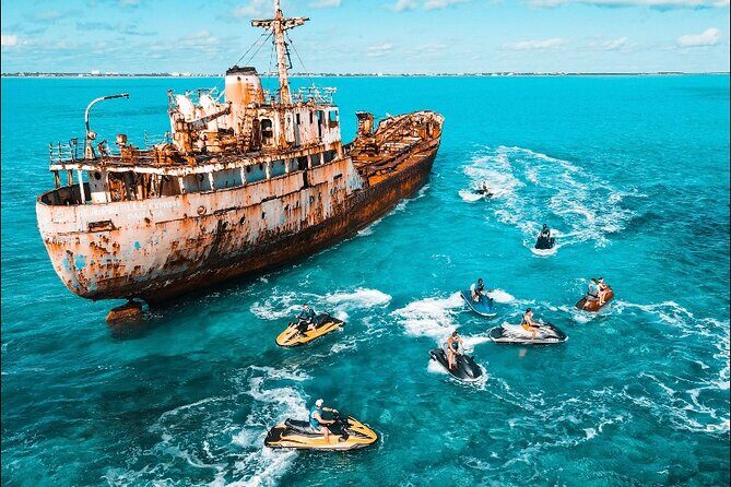 Jet Skiing around La famille ship and smaller pristine cays - La Famille Express: The Shipwreck That Actually Shapes Your Ride