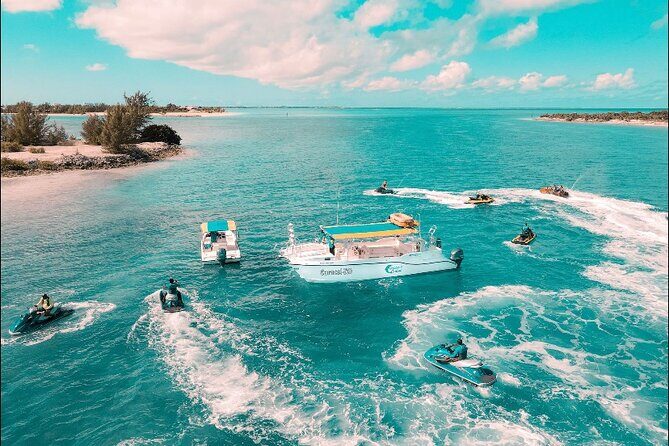 Jet Skiing around La famille ship and smaller pristine cays - The Stops You’ll Likely Want to Plan Around